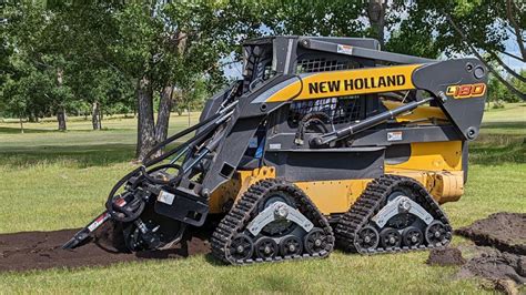 changing tracks on skid steer